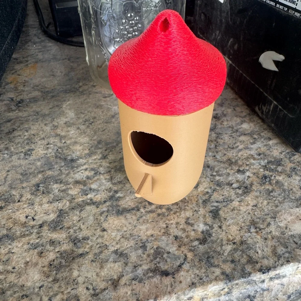 Red and Tan Birdhouse humming bird